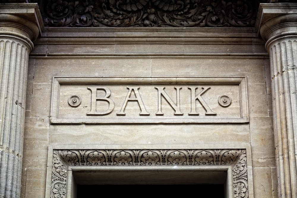 Carved stone facade of a historic Swiss bank building